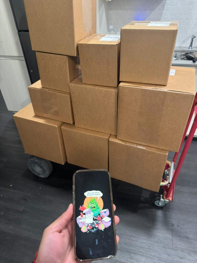 Smacking Tickets daily order fulfillment — rows of packages ready for fast shipping.